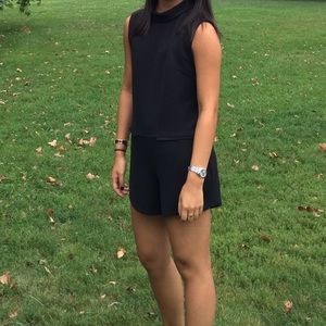 Mock neck black romper with open back